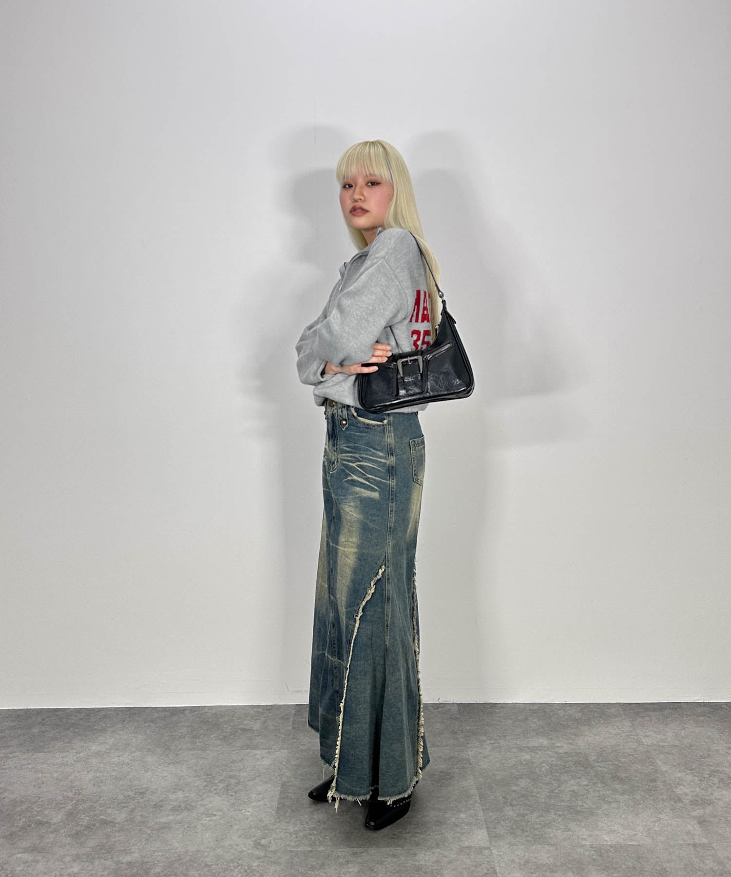 バックロゴハーフジップニット