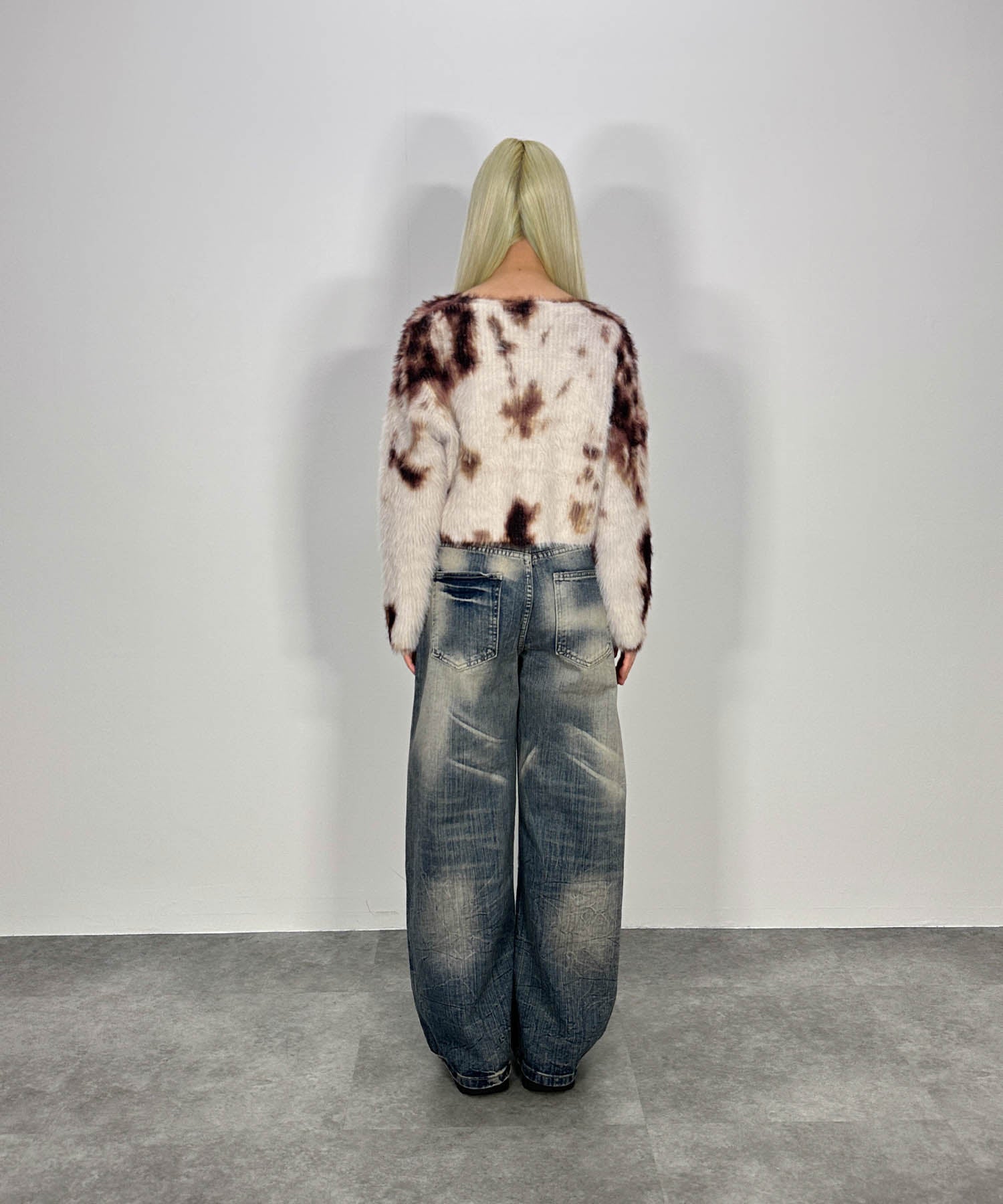 ニュアンス柄ルーズネックニット