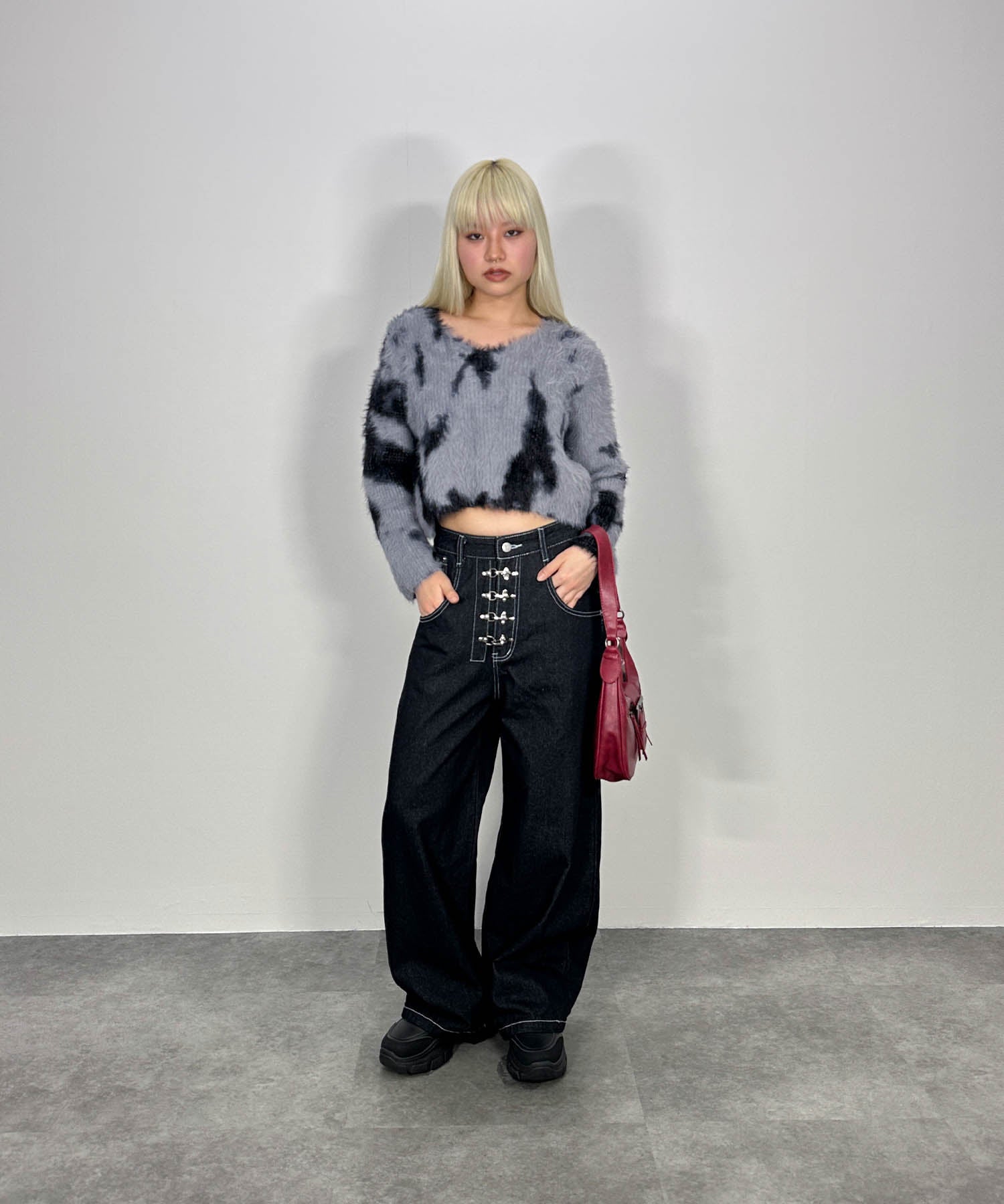 ニュアンス柄ルーズネックニット