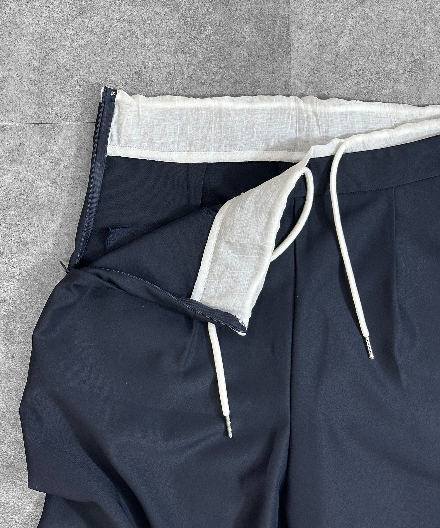 ウエストレイヤードスラックス